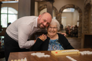 A resident of Tuscan Gardens of Palm coast and her loved one.