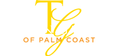 Tuscan Gardens of Palm Coast logo, located in the footer of the website page, featuring a stylized 'TG' in gold above the company name in white and gold text on a dark blue background