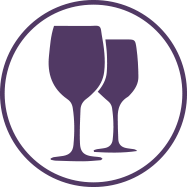 Icon of a wine glass and a cocktail glass inside a circle frame representing 'Social Events & Happy Hours' in the Memory Care amenities section